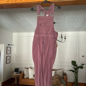 Duluth overalls in an eggplant color size xs regular